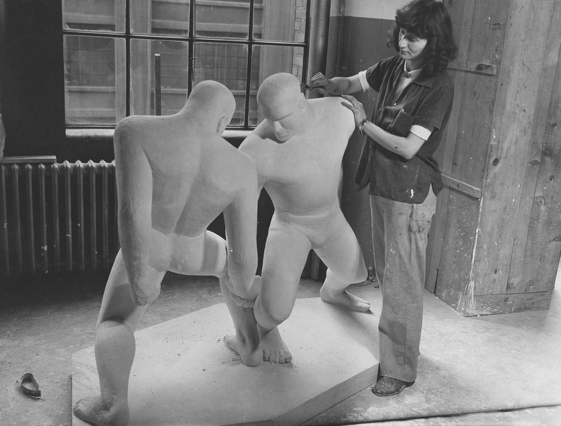 Josephine Frankel Levy with her sculpture The Wrestlers, Federal Art Project, Photographic Division collection, circa 1920-1965, bulk 1935-1942, Archives of American Art, Smithsonian Institution